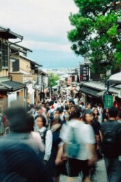 Crowded street in a japanese town with motion-blurred people