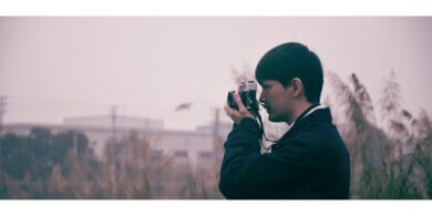 a man taking a picture with a camera